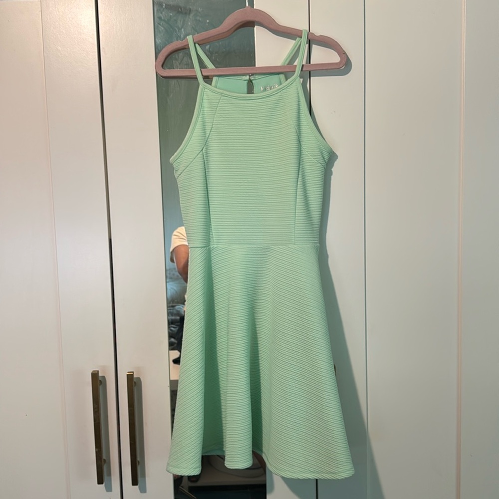 Mint green dress size medium/10 with lining and embroidered strips